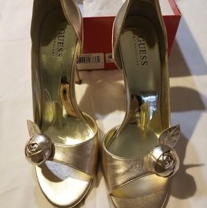 Guess gold leather open toe with rose bud on toe
